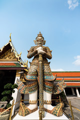 Fototapeta na wymiar A standing giant guardian sculpture in Wat Prakaew Thailand