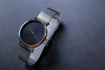 Wrist watch for women on black background
