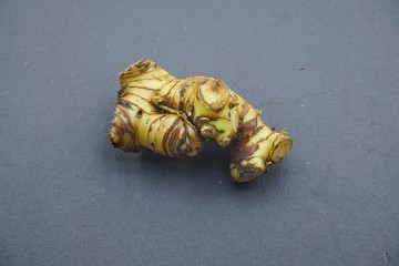 galangal (Alpinia galanga) on a black background.
