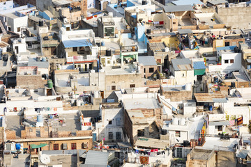Fototapeta premium View from above, stunning aerial view of the Jodhpur Blue City, Rajasthan, India. Jodhpur is a city in the Thar Desert of the northwest Indian state of Rajasthan, India.
