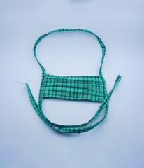 green mouth mask to cover mouth and nose so that dirty air does not enter the body. One way to prevent the transmission of Corona Covid-19 Virus is by using this tool.