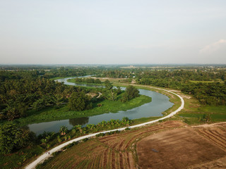 Top down view Sungai Perai near paddy field plantation.