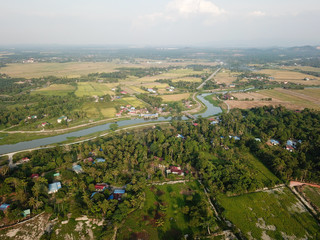 Fototapeta na wymiar Landscape view of Sungai Perai near the paddy field.