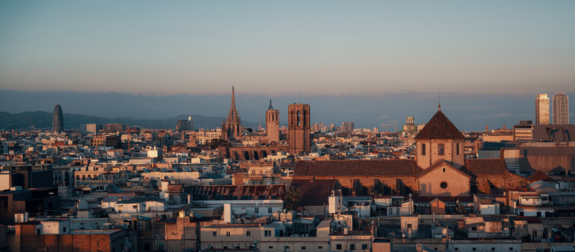 Scenic view of city at sunset against clear sky
