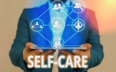 Text sign showing Self Care. Business photo showcasing the practice of taking action to improve one...