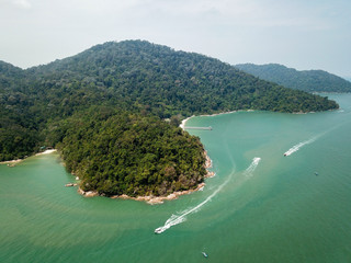 Drone view tourism boat bring tourist to Penang National Park.