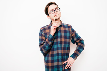 man is thinking about something with pencil