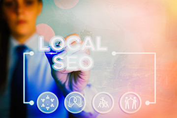 Writing note showing Local Seo. Business concept for helps businesses promote products and services...