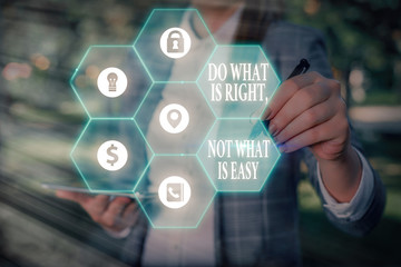 Writing note showing Do What Is Right Not What Is Easy. Business concept for willing to stand up...
