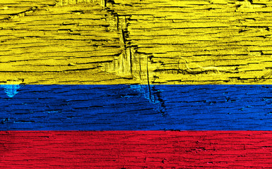 Colombia flag on damaged wooden board