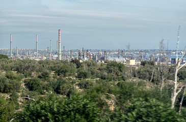 refinery on the seashore, the general plan.
 oil and gas petrochemical industrial, Refinery factory oil storage tank and pipeline steel.