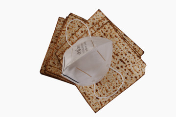 Matzah - Traditional Jewish food for Passover is covered in a mask against the Corona virus.