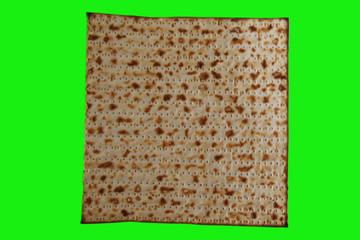 Matzah. Traditional Jewish food for Passover. Green screen background.