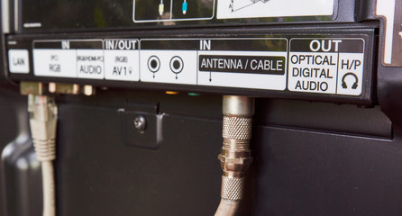The rear view - backside - with connectors and cable of a lcd television.