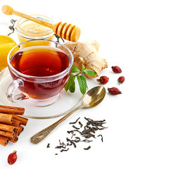 Cup tea with ginger cinnamon mint and lemon. Drink of cold traditional medicine. Isolated on white...