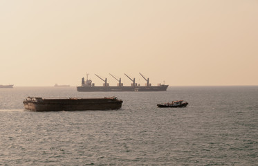 Silhouette Logistics and transportation of International Container Cargo ship in the ocean