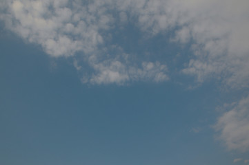 blue sky and small clouds in the right corner of the image