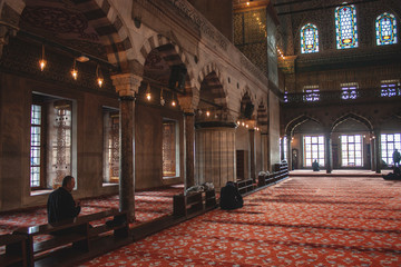 Muslim praying in mosque
