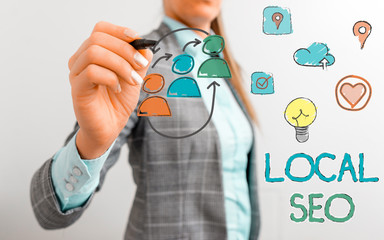 Writing note showing Local Seo. Business concept for optimize your website to rank better for a...