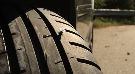 Vehicle Tire Punctured By The Screw © AnyVIDStudio