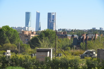 Contrast of the modern with the simple and old in Madrid - Spain.