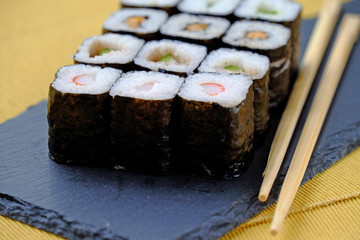 set of japanese sushi on a tray