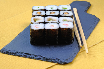 set of japanese sushi on a tray
