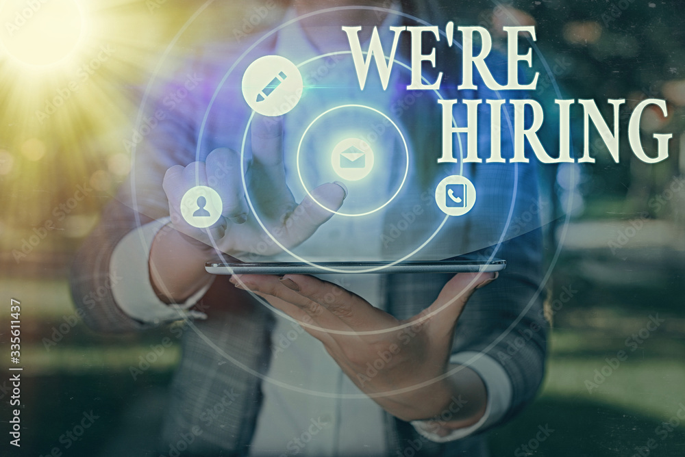 Poster handwriting text we are re hiring. conceptual photo process of reviewing applications and finding ca