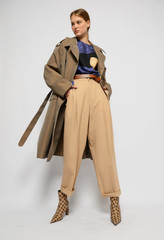 Fashion shooting in studio . Professional model , fashionable clothes and style, new collection....
