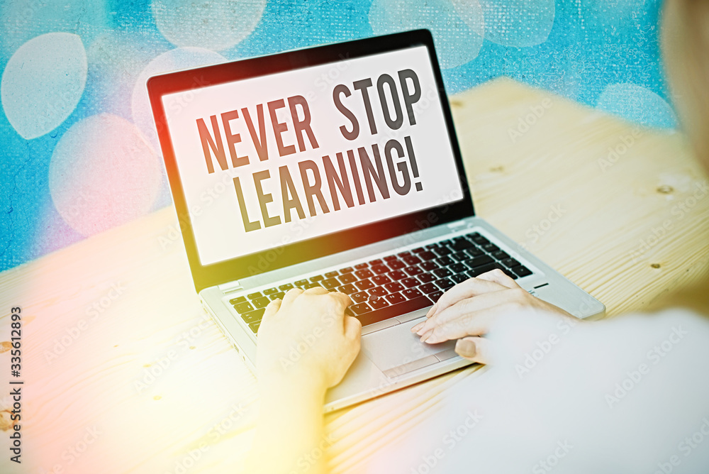 Poster handwriting text never stop learning. conceptual photo keep on studying gaining new knowledge or mat