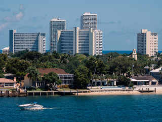 Fototapeta na wymiar Miami, USA - March 29,2020: casual view on the buildings and streets near port Everglades at sunny weather