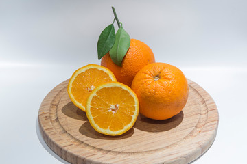 Sweet orange fruit on a cutting board