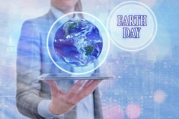 Conceptual hand writing showing Earth Day. Concept meaning Worldwide celebration of ecology...