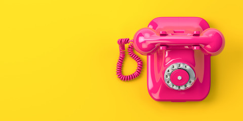 Vintage pink telephone on yellow background. - obrazy, fototapety, plakaty
