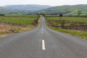 Fototapeta na wymiar country road in the countryside Cumbria 