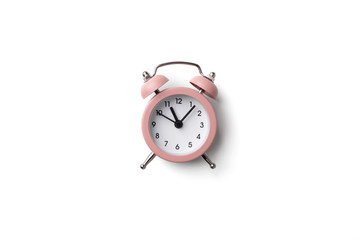 Pink alarm clock isolated on white background with copy space