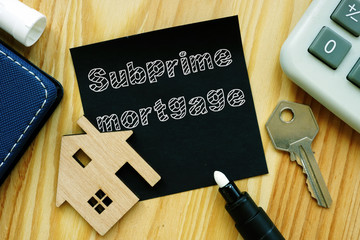 Conceptual hand written text showing Subprime mortgage