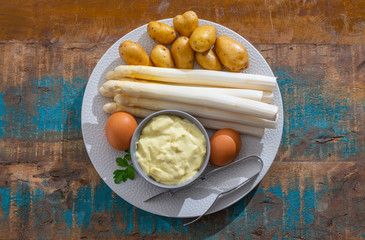 Ingredients for spring vegetarian dinner, high quality Dutch white asparagus, washed and peeled on...