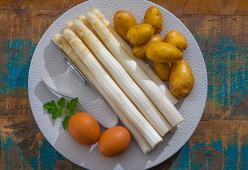 Ingredients for spring vegetarian dinner, high quality Dutch white asparagus, washed and peeled on...