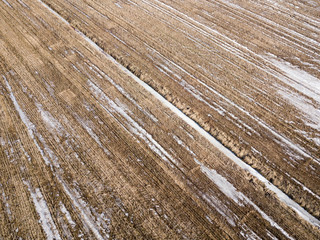 Aerial view of stubble field in springtime