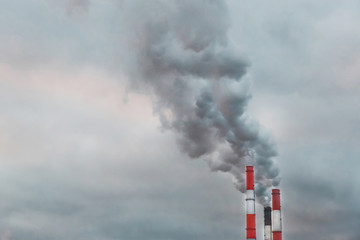 Environmental pollution, environmental problem, smoke from the chimney of an industrial plant or...