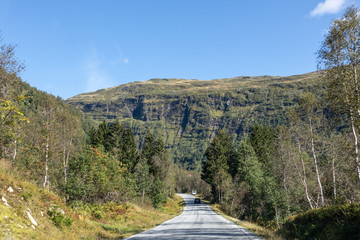 Drive Norway route. Summer green blight sunny day in scandinavia mountains