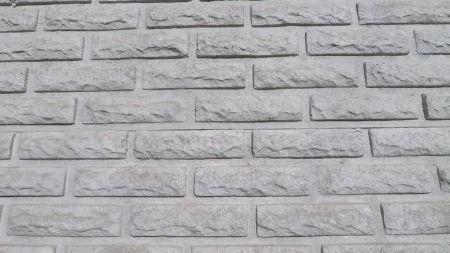 background texture brick fence of molded concrete sections
