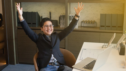 Young business smart man  happy he  successfully in job though he work from home online working, he...