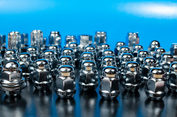 car wheel nuts, closeup abstract background