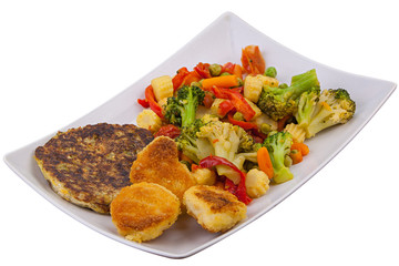 vegetables gorse or tomatoes corn peas bell peppers carrots on plate