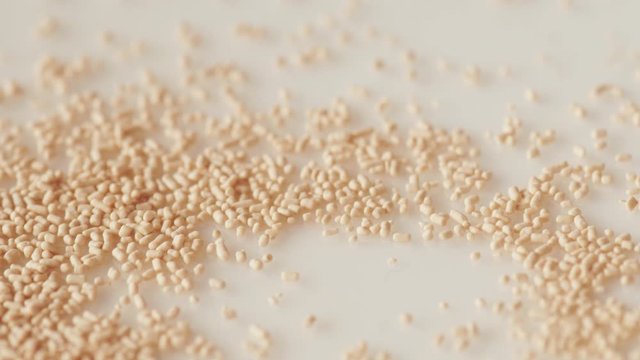 spilling pouring dry instant yeast falling extreme macro