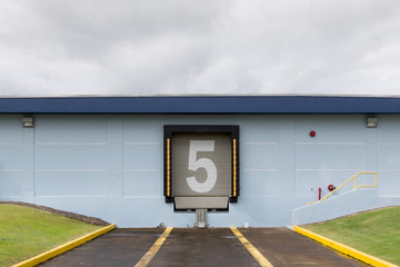 Number 5 on warehouse door