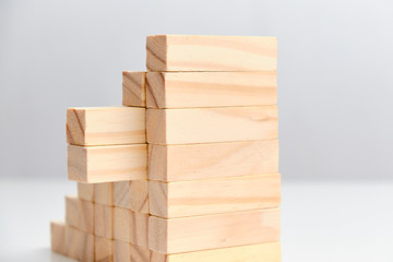 Business diversification concept. Wooden blocks on a white background background.