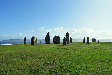 Menhirs of the Sculpture Park of the Tower of Hercules in La Coruña, Galicia. Spain. Europe....